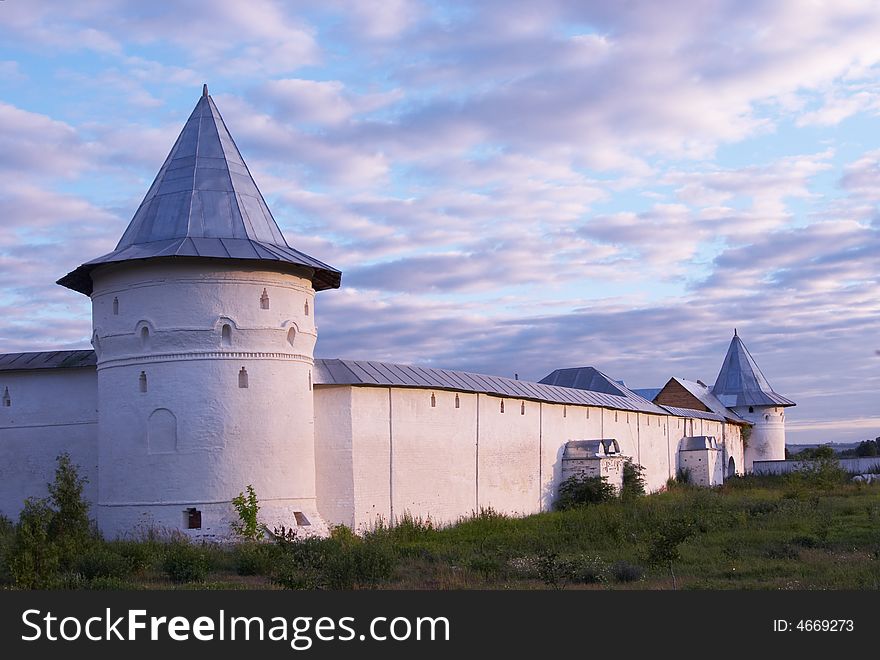 Ancient Thick White Fencing With Towers