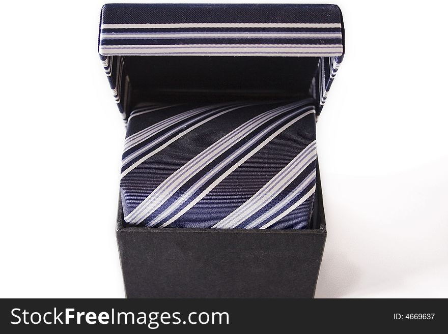 Silk necktie with box, isolated on the white background