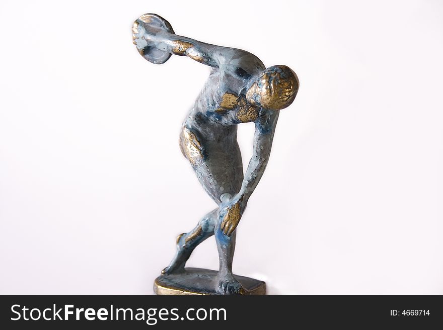 Metalic statue of greek discobolus isolated on the white background