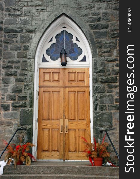 The wooden doors of a stone church built in 1863. The wooden doors of a stone church built in 1863