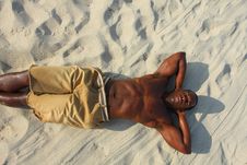 Man Laying On The Sand Royalty Free Stock Photography Man Laying On The Sand Royalty Free Stock Photography