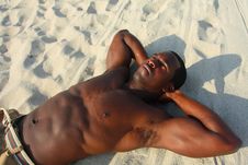 Man Laying On The Sand Stock Photography Man Laying On The Sand Stock Photography