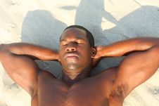 Man Laying On The Sand Stock Image Man Laying On The Sand Stock Image