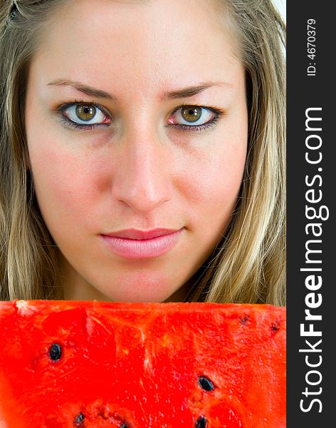 Close-up portrait of a girl with red water-melon. Close-up portrait of a girl with red water-melon