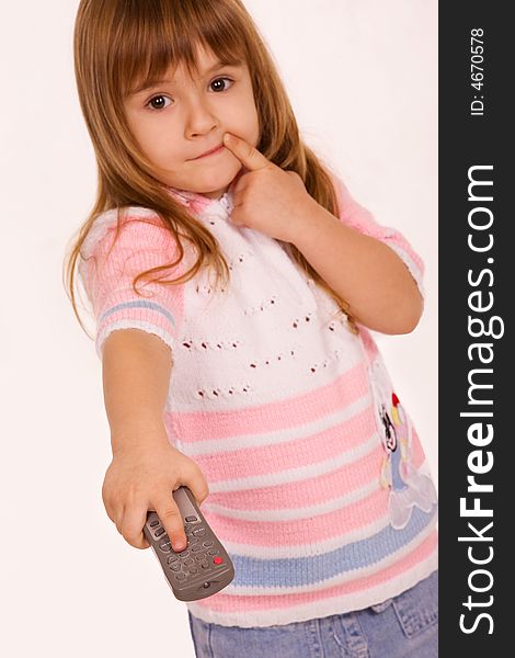 Little girl holding remote control pad