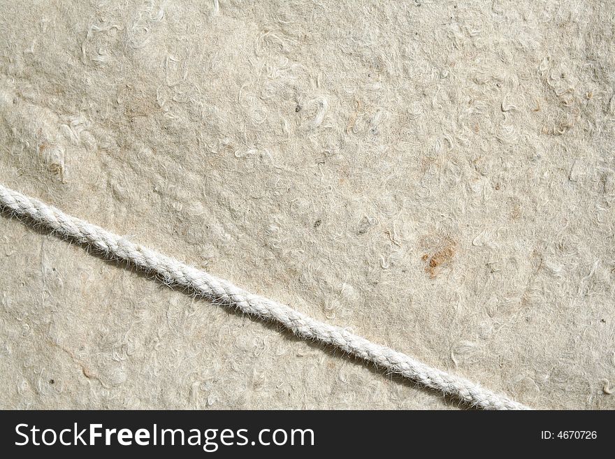 Background material of old wool carped with rope