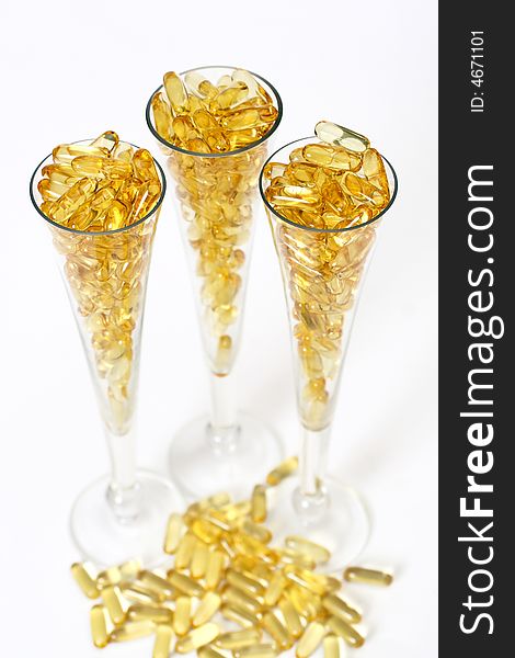 Three glasses with gold boluses