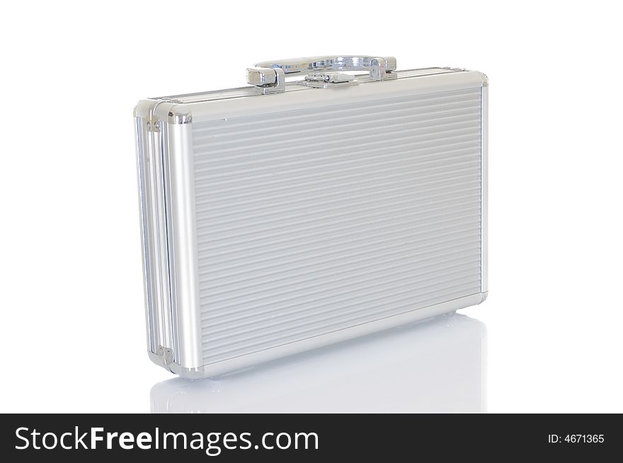 Metal case for cosmetics on white background , reflective surface