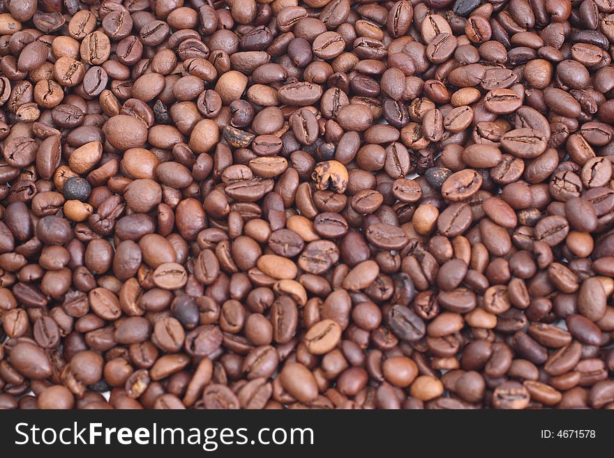 Dark rich coffee beans background