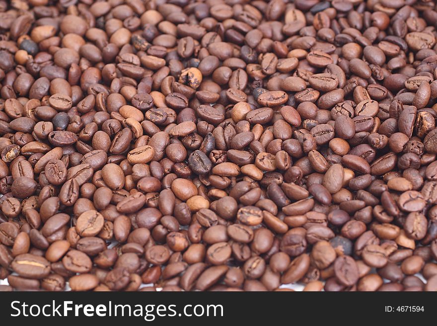 Dark rich coffee beans background