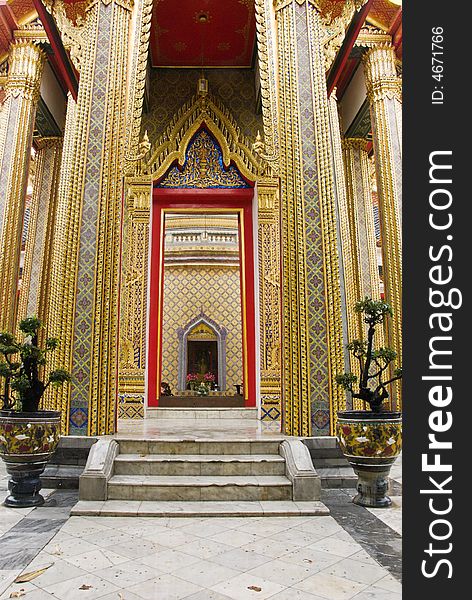 Buddhist temple with golden decorated walls