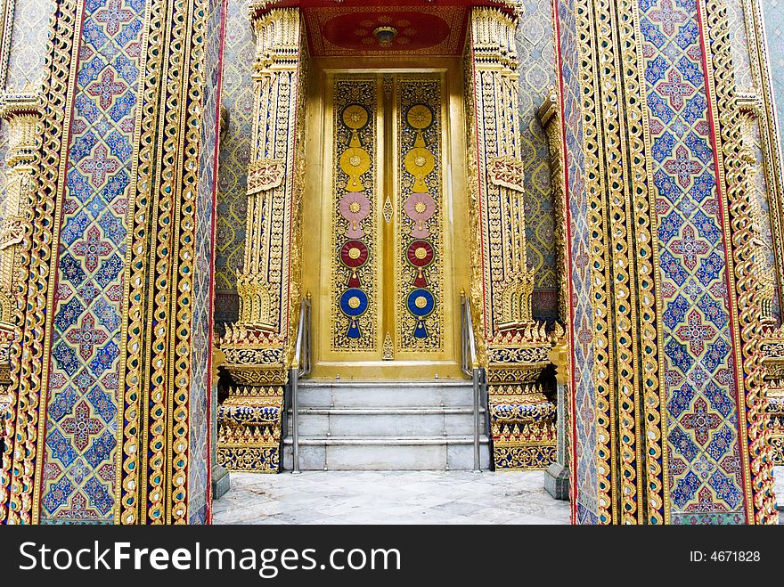 Golden buddhist temple with decorated walls