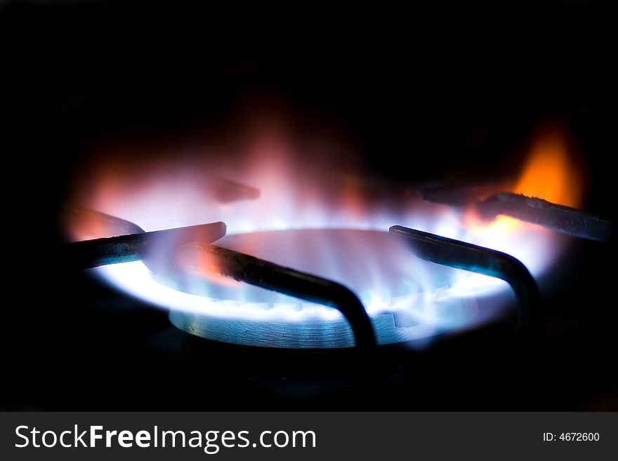 Natural gas burner with flame isolated on black background. Natural gas burner with flame isolated on black background
