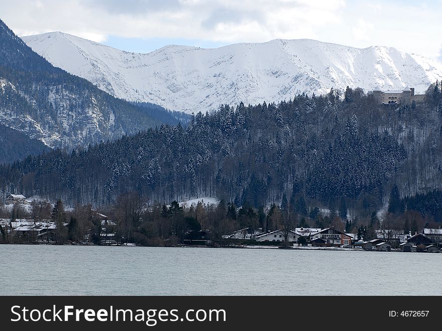 Rock wall in the ice and snow in the Bavarian Alps