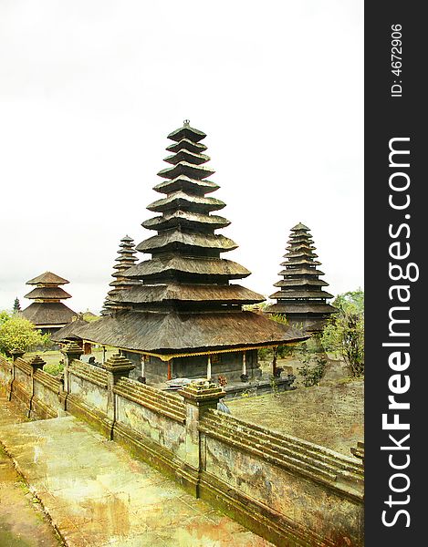 Ancient Balinese temple - toned picture in painting style. Ancient Balinese temple - toned picture in painting style