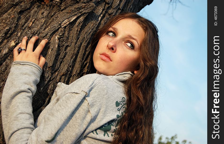 Girl near the tree