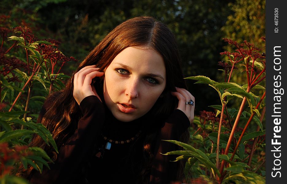 Teenage girl in high grass alone