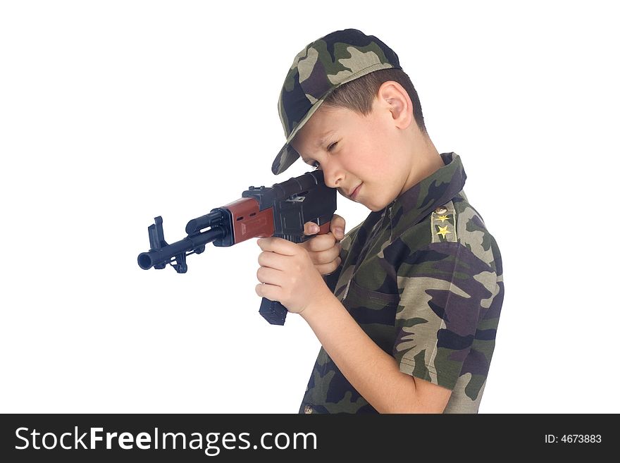 Young boy hold gun isolated on white background