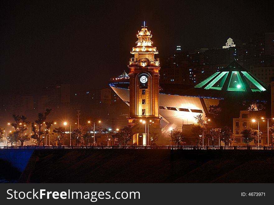 Ancient clock building with new gymnasiumã€‚
. Ancient clock building with new gymnasiumã€‚