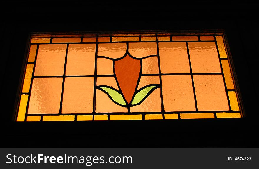 Stained-glass window with a flower