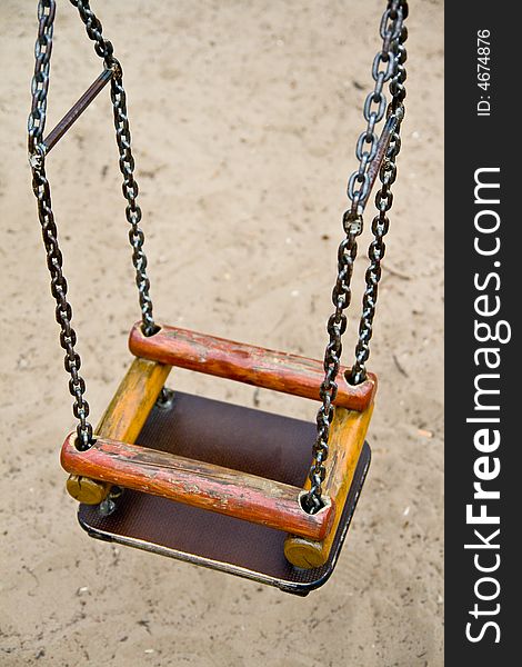 The swing with chains in the park