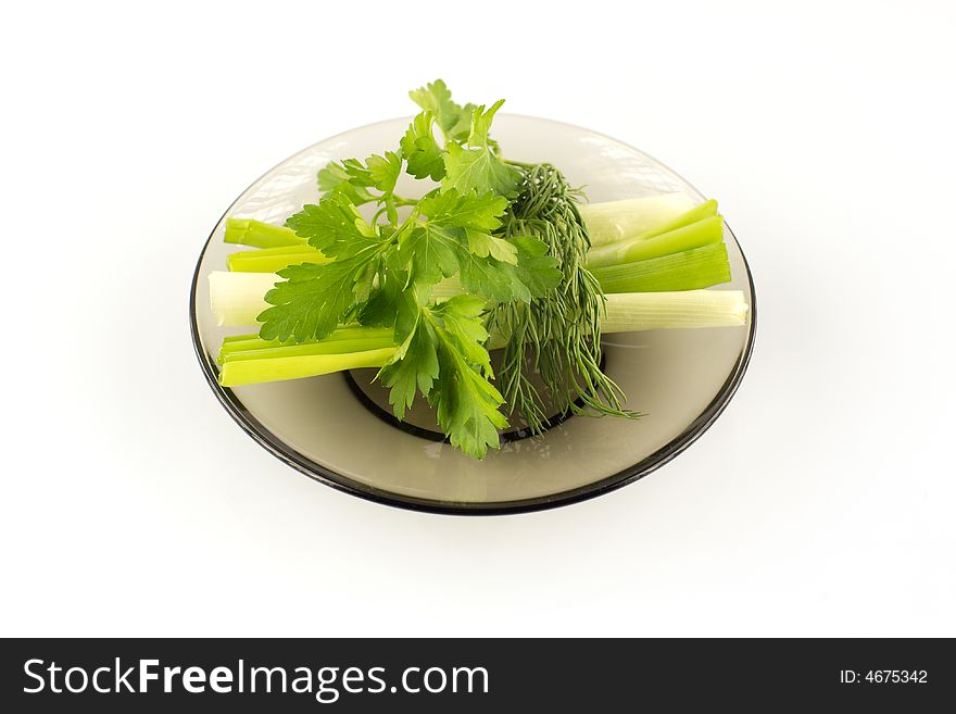 Green Onion, Dill And Parsley On A Dark Plate