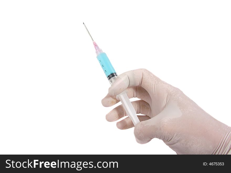 Hand with a syringe isolated on white. Hand with a syringe isolated on white
