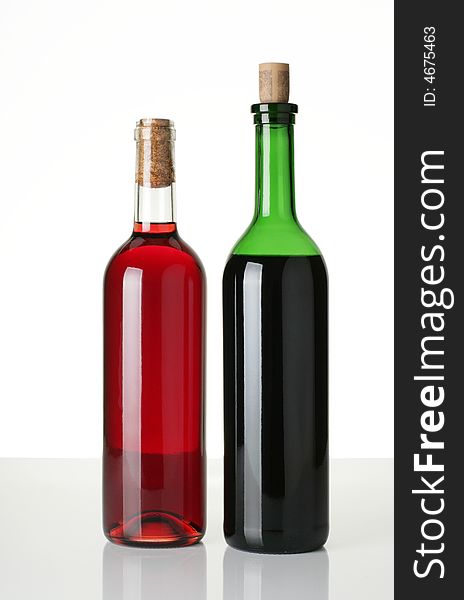 Two bottles of wine on white background