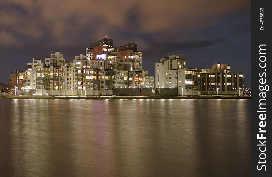 Night view of houses by the sea