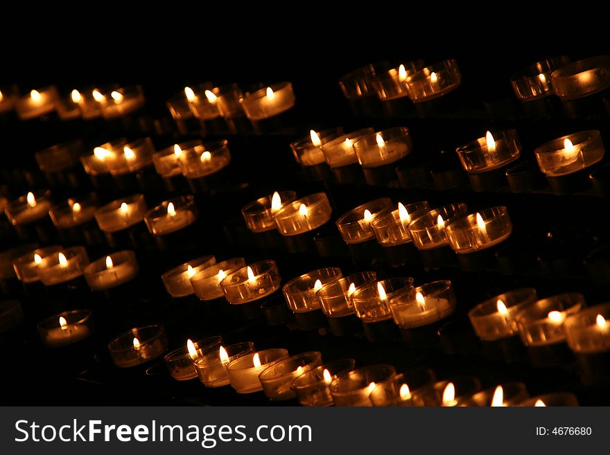 Small red candles in a church