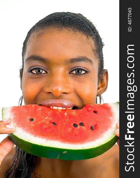 Lovely african girl eating a water-melon