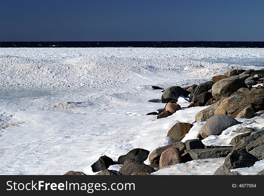 Georgian Bay shoreline covered in ice and snow. Georgian Bay shoreline covered in ice and snow