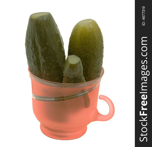 Glass Mug With Cucumbers On A White Background.