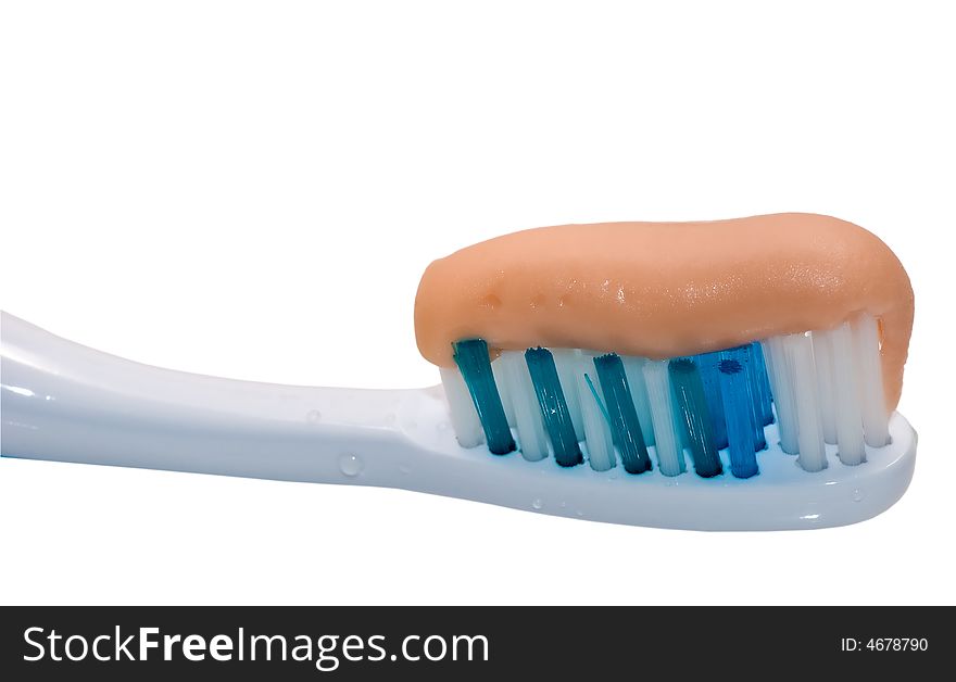 Dental brush with healthy paste isolated over white