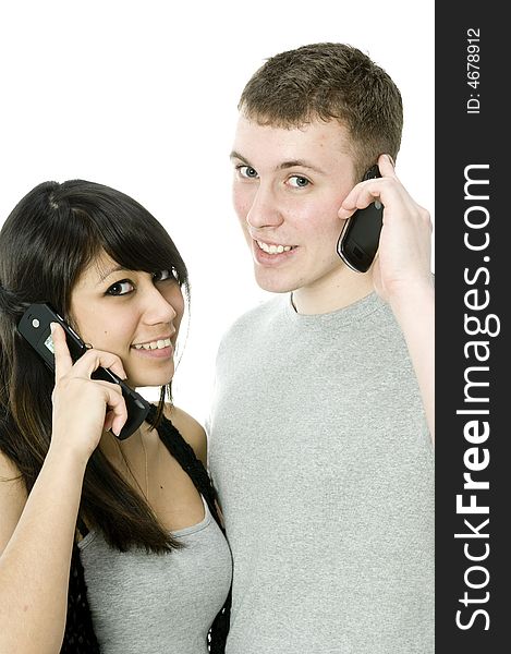 A young happy couple on the phone to each other