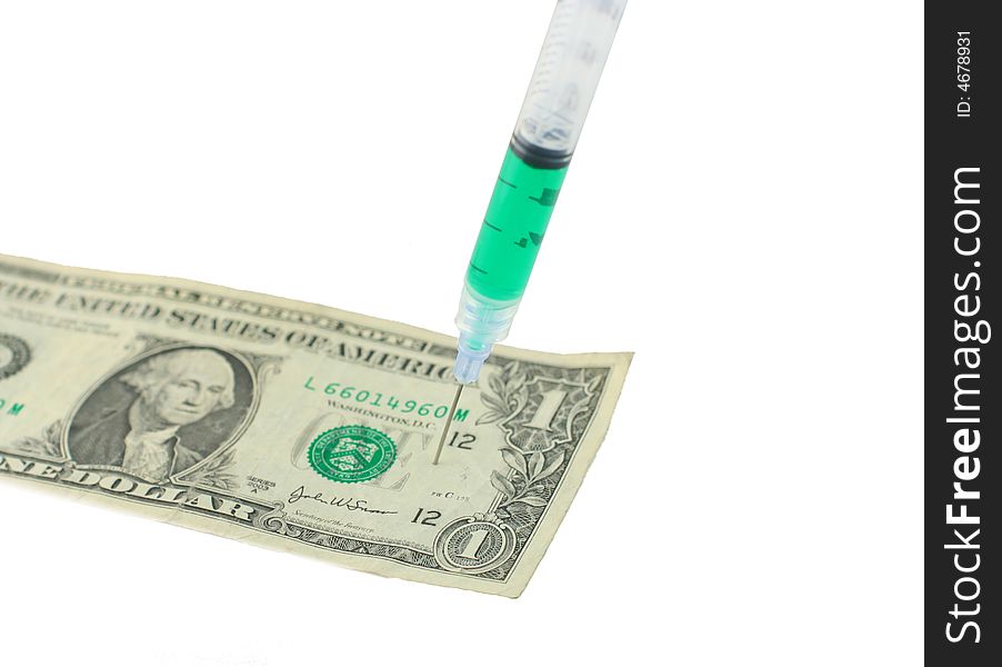 US one dollar bill with syringe needle sticking in it on white background. US one dollar bill with syringe needle sticking in it on white background