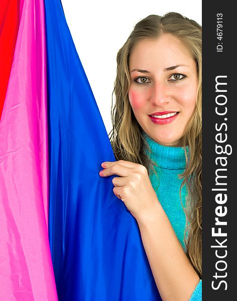 Joyfully smiling young woman with a blue-red and purple flag