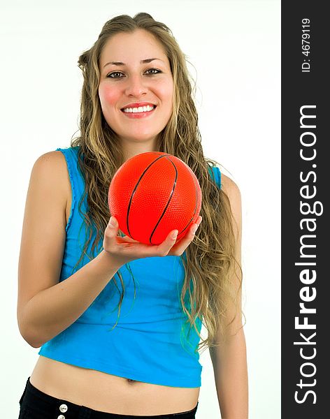 Smiling lady in blue with a small red ball in hands