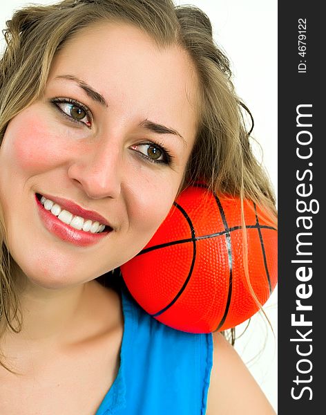 Smiling lady in blue with a small red ball on her shoulder. Smiling lady in blue with a small red ball on her shoulder