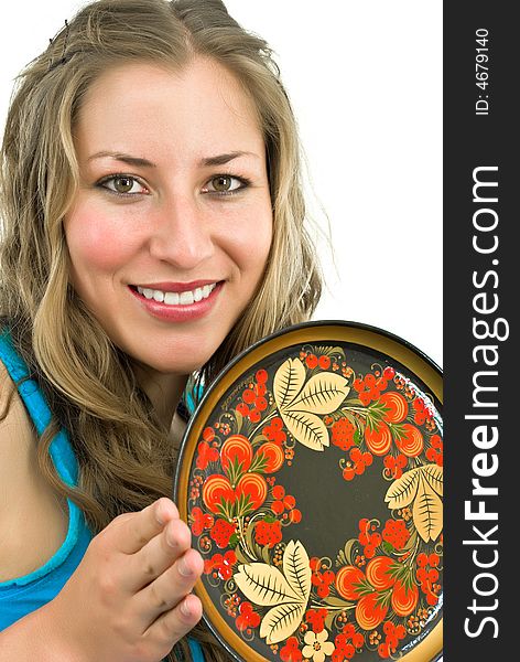 Nice young woman with a colorful wooden dish in her hands. Nice young woman with a colorful wooden dish in her hands