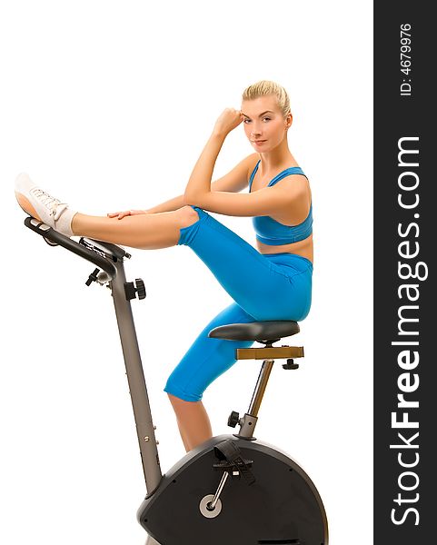 Woman On Exercise Bicycle