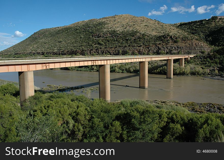 A narrow bridge over a river in South Africa. A narrow bridge over a river in South Africa.