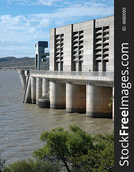 A large concrete dam wall, photographed in South Africa.