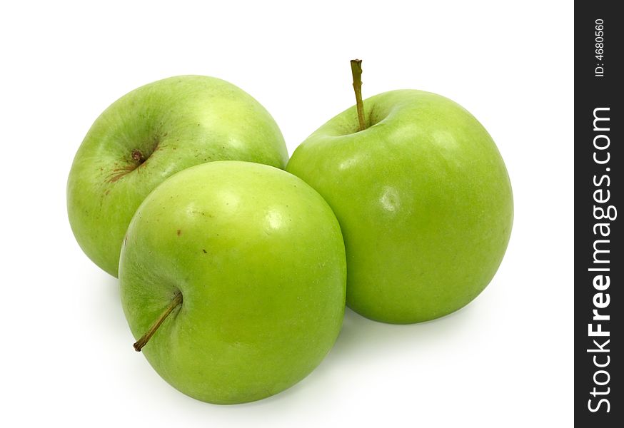 Three green apples isolated on white background