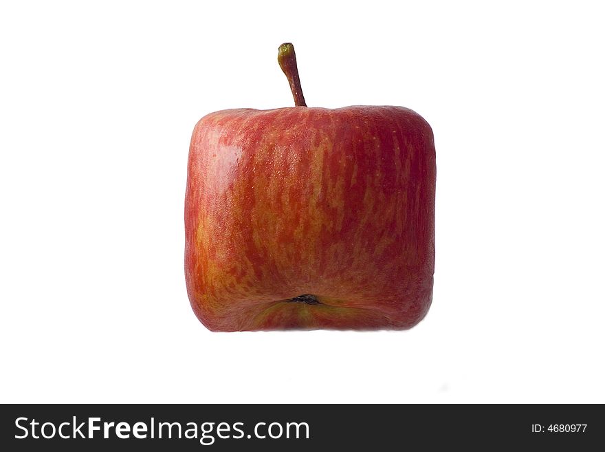 Red fresh apple in the shape of a cube on a white background. Red fresh apple in the shape of a cube on a white background