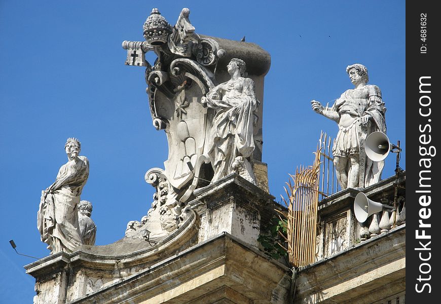 Vatican Logo and Statue