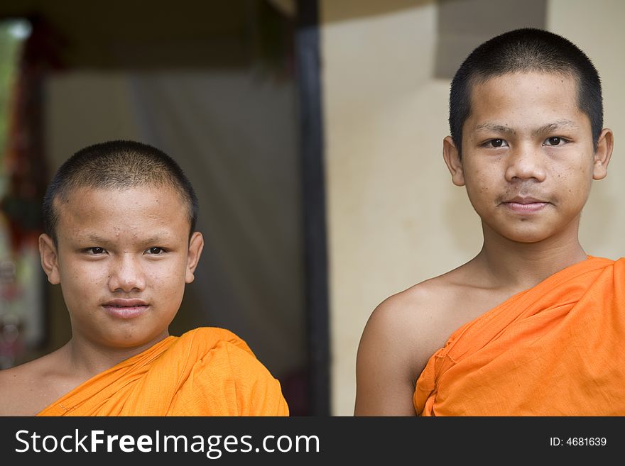 Buddhist monk from Thailand in traditional orange garb