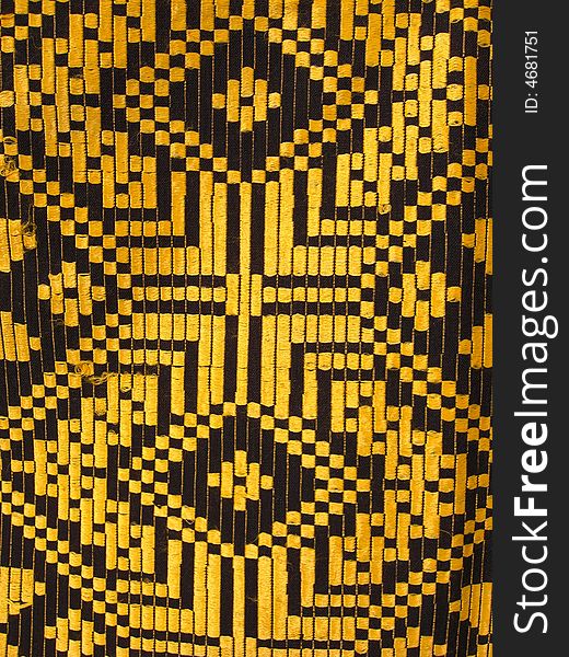Belarussian national ornament in black and yellow.