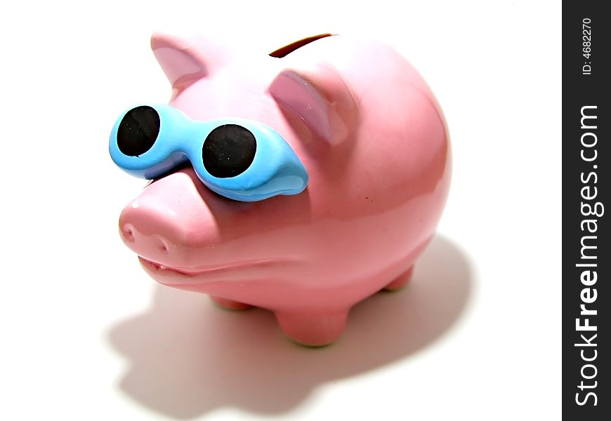 A pink piggy bank isolated on a white background.