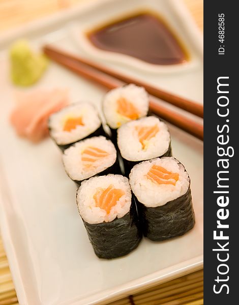 Japanese kitchen. Salmon rolls and hashi. Japanese kitchen. Salmon rolls and hashi